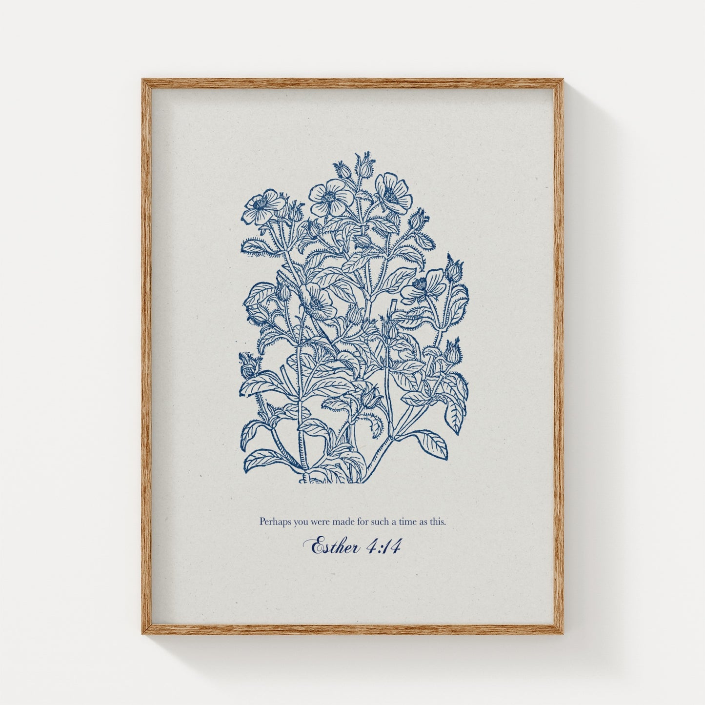 Botanical art print featuring intricate blue floral illustrations and the Bible verse Esther 4:14 in script, framed in natural wood on a white background.