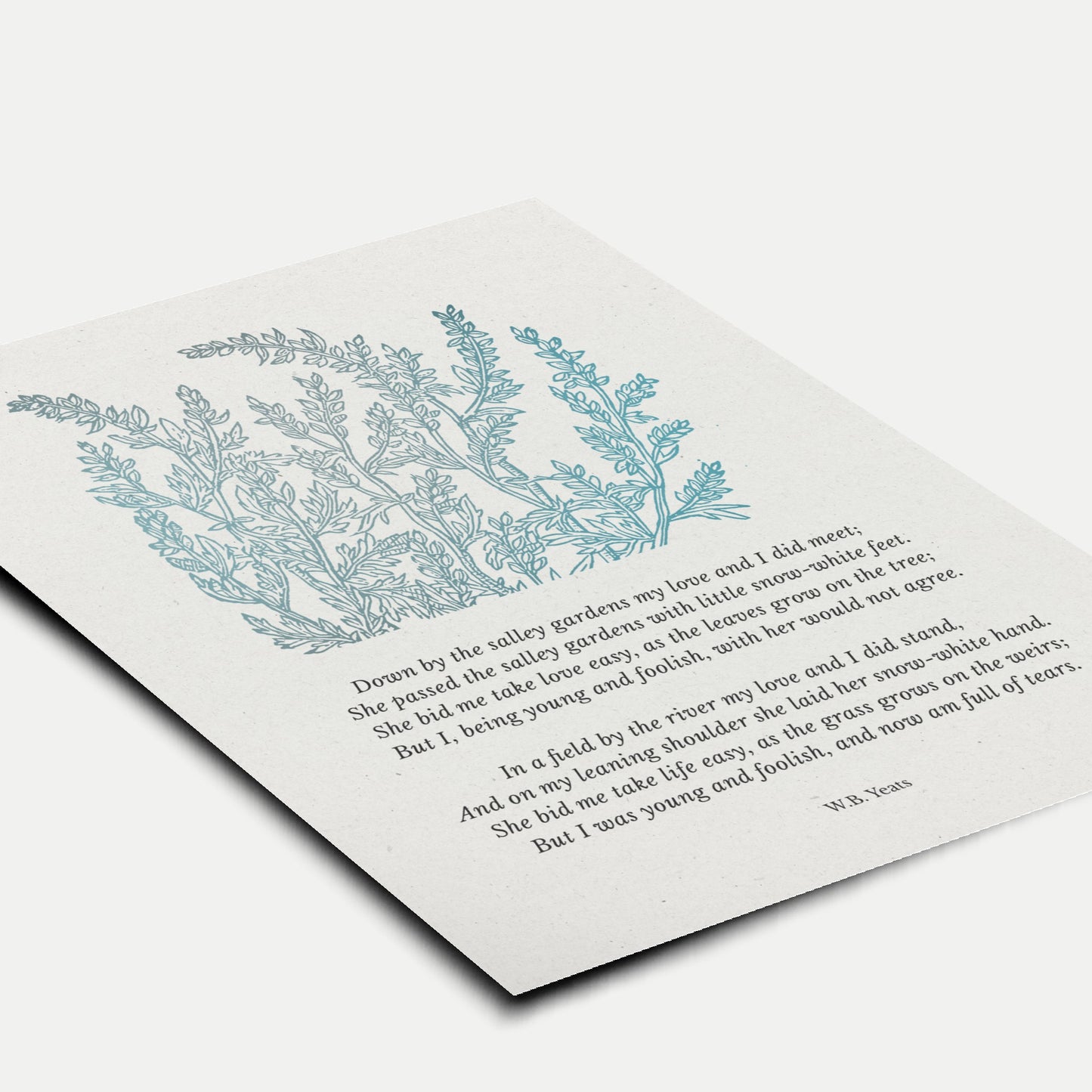 A close-up view of the art print laid flat, highlighting the detailed botanical illustration and timeless typography of the Yeats poem.