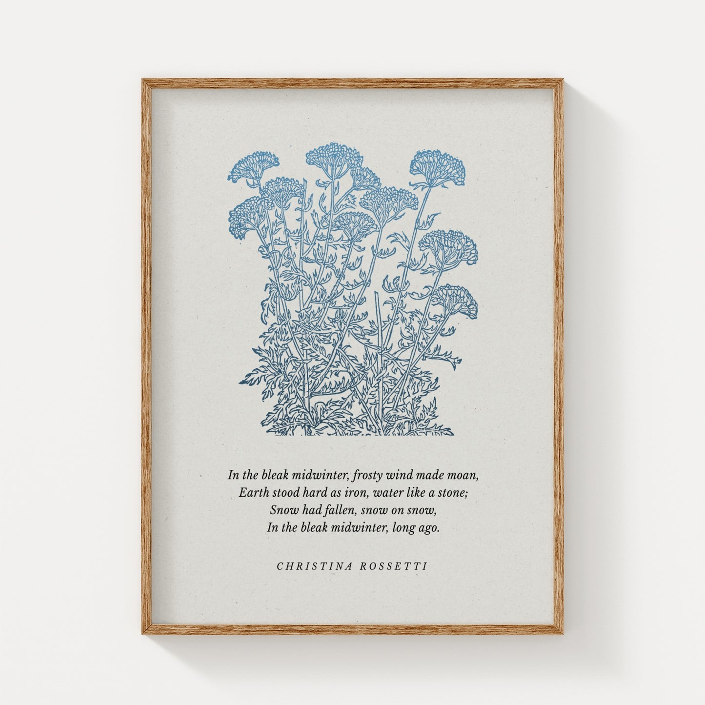 Botanical art print featuring delicate blue wildflowers and a quote by Christina Rossetti, framed in natural wood and displayed on a neutral background.