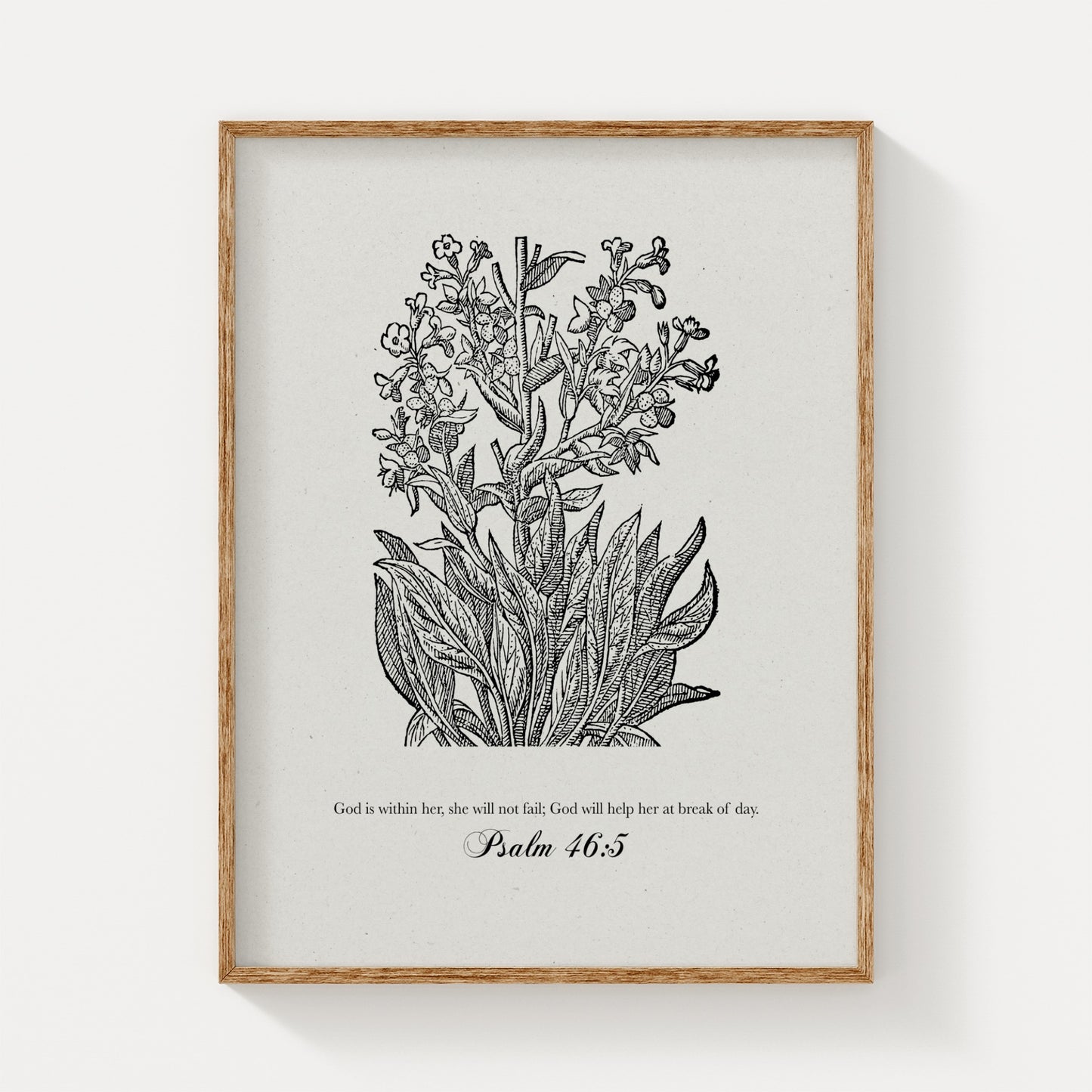 Vintage-inspired black floral botanical art print featuring Psalm 46:5, displayed in a natural wood frame on a light beige background for a timeless look.