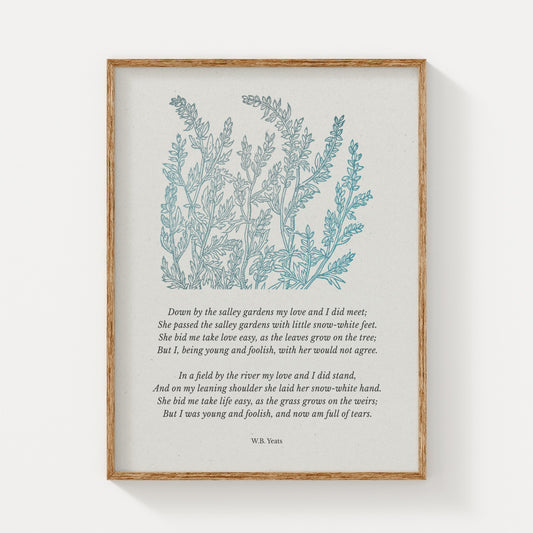A vintage-inspired art print featuring W.B. Yeats’ poem “Down by the Salley Gardens,” paired with soft blue botanical illustrations, elegantly framed in natural wood on a neutral background.