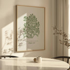 Framed Esther 4:14 Christian botanical art print on a wall above a table with a plant.