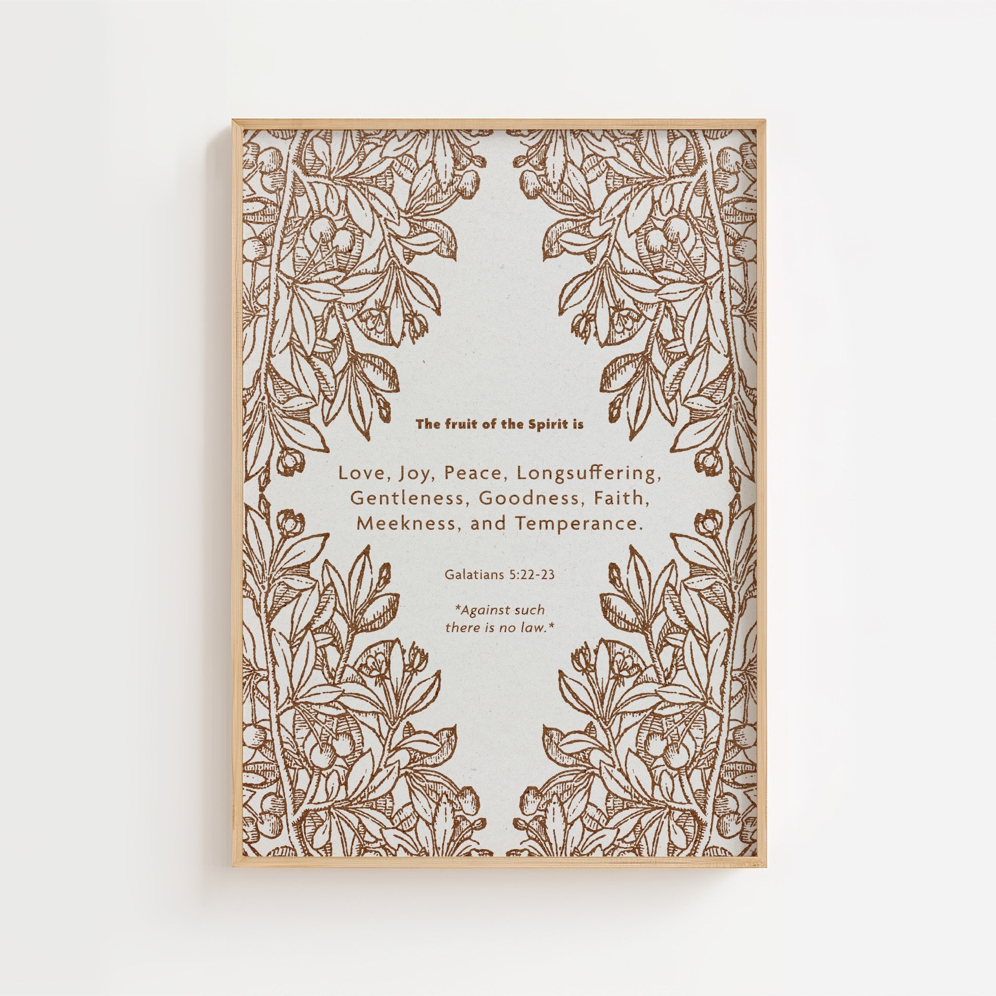 Decorative wall art with floral design and fruit of the Spirit on a white background