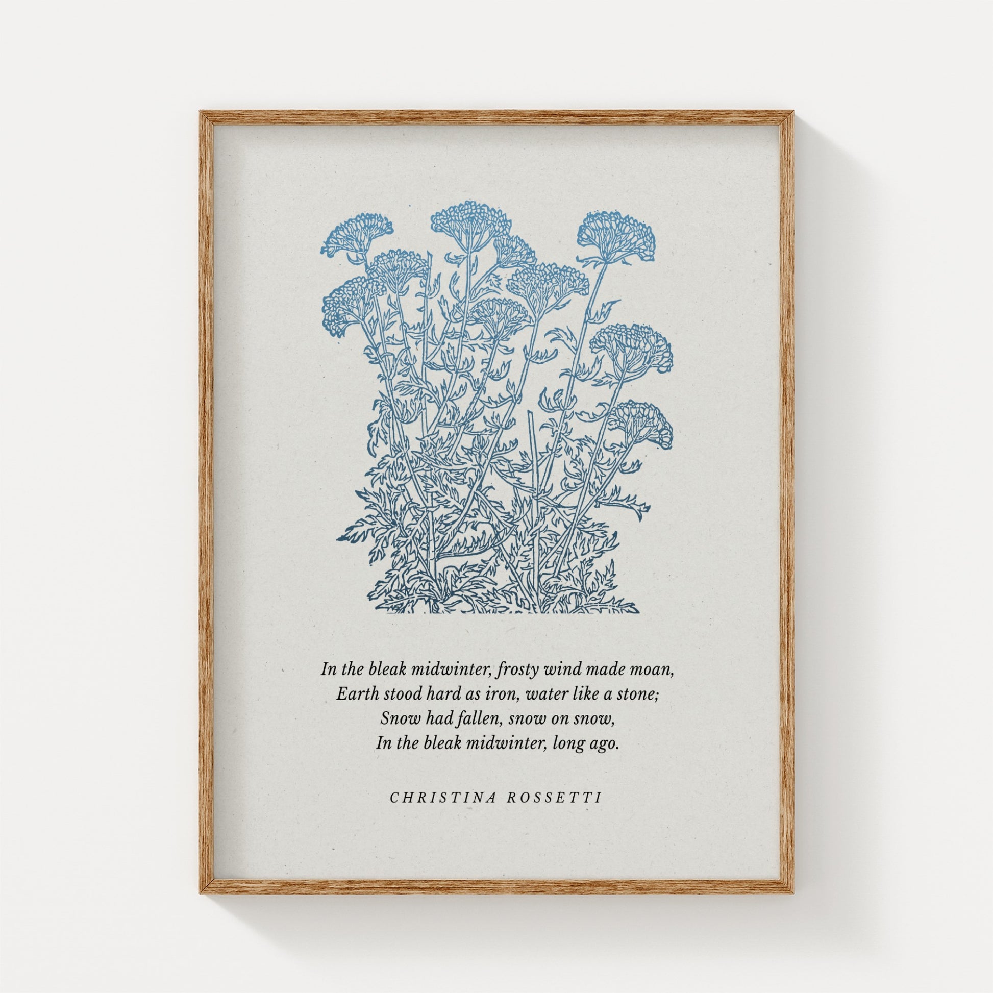 Botanical art print featuring delicate blue wildflowers and a quote by Christina Rossetti, framed in natural wood and displayed on a neutral background.